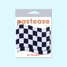 Load image into Gallery viewer, Pastease Checkered Flag Racing Breast Pasties in packaging, showing bold black and white chequered flag print with a glittery finish. Designed for all breast shapes and sizes, these fun and flirty nipple covers are made in the USA by a small family business and distributed worldwide.