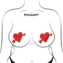 Load image into Gallery viewer, Illustration of Pastease® Cupid's Arrow Red Heart Breast Pasties worn on a fuller bust. The disco red sparkle design with an arrow creates a bold, flirty look. Comfortable, easy to wear, and perfect for any breast size. Handmade by Pastease® in the USA.