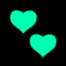 Load image into Gallery viewer, Glowing Pastease® Neon Turquoise Heart Pasties on a black background. The illuminated hearts stand out boldly, capturing the fun, flirty spirit of this small family-run brand that creates nipple covers for all breast shapes and sizes.