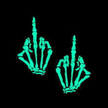 Load image into Gallery viewer, Pastease Skeleton Middle Finger Hand Pasties glow in the dark. Featuring black and white boney hand designs, these nipple covers are fun, flirty, and perfect for bold party vibes. Made in the USA for all breast shapes and sizes by a family-run brand.