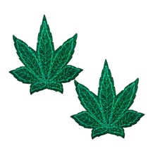 Load image into Gallery viewer, Coverage: Pot Leaf Glitter Green Full Breast Covers Support Tape by PasteaseĀ®. Two green glittery weed leaf shaped nipple covers on a white background. Perfect for a festival, pride, burlesque performance, only fans content, 420 or a party.