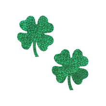 Load image into Gallery viewer, The Four Leaf Clover: Glittering Green Shamrocks Nipple Pasties by Pastease® on a white background. Two green glitter four leaf clover nipple covers. Perfect for a festival, burlesque performance, drag shows, pride or parties.