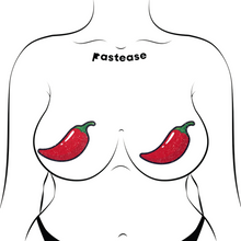 Load image into Gallery viewer, Chilli Pepper Pasties in Spicy Red by Pastease. Two sparkly glitter red chilli pepper shaped nipple covers shown on a femme body outline for size reference on a white background.