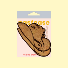 Load image into Gallery viewer, The Wild West Brown Suede Cowboy Hat Nipple Pasties Stylish Nipple Covers by Pastease®. Two suede brown cowboy hat shaped nipple covers in the pastease pastel packaging on a pastel yellow background. Perfect for a festival, burlesque performance, pride or parties.