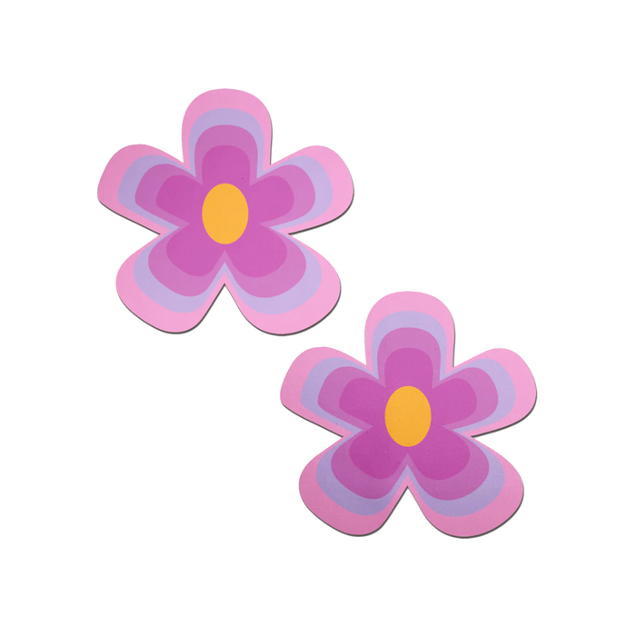 Purple Groovy Flower Pasties by Pastease. Two nipple covers with various shades of pink and purple outlining the yellow centre in a y2k style flower shape on a white background. Perfect for a festival, burlesque performance, onlyfans content, pride or parties.