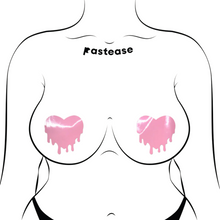 Load image into Gallery viewer, Melty Heart: Faux Latex Pleather Vinyl Baby Pink Melty Heart Nipple Pasties by Pastease®. Two shiny pastel pink drippy heart shaped nipple covers shown on a femme body outline for size reference on a white background.
