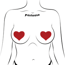 Load image into Gallery viewer, Love: Red Heart Nipple Pasties by Pastease®. Two matte red heart shaped nipple covers shown on a femme body outline for size reference on a white background.