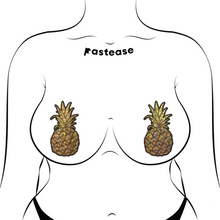 Load image into Gallery viewer, The Pineapple on Glitter Gold Nipple Covers by Pastease®. Two gold glittering shimmer pineapple nipple covers shown on a femme body outline on a white background. Perfect for a festival, burlesque performance, drag shows, pride or parties.