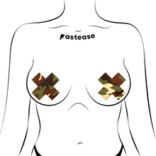 Load image into Gallery viewer, Plus X: Green Camo Cross Nipple Pasties by Pastease®. Two green, brown, and cream camouflage cross shaped nipple covers shown on a femme body outline for size reference on a white background.