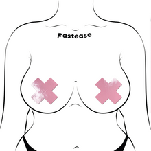 Load image into Gallery viewer, Plus X: Faux Latex Pleather Vinyl Baby Pink Cross Nipple Pasties by Pastease®. Two shiny pastel pink cross shaped nipple covers shown on a femme body outline for size reference on a white background.