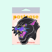 Load image into Gallery viewer, The Black Panther Pasties Roaring Couger Tattoo Diamond Thom™ Nipple Covers by Pastease in a the pastease pastel cellophane packaging on a pastel blue background. Two angry roaring panther big cat nipple covers in a traditional old school tattoo style with purple, pink and yellow highlights. Perfect for a festival, burlesque performance, drag shows, pride or parties.