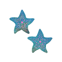 Load image into Gallery viewer, The Starfish: Twinkling Seafoam Green & Pink Print Sea Star Nipple Pasties by Pastease®. Two aqua blue with holographic glitter and pink dots starfish shaped nipple covers on a white background. Perfect for a festival, burlesque performance, pride or parties.