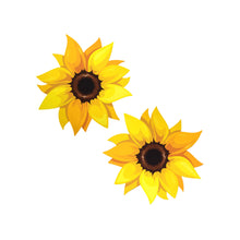 Load image into Gallery viewer, The Sunflower Pasties Nipple Covers by Pastease on a white background. Two yellow sunflower shape nipple covers with brown middles and golden warm yellow petals surrounding. Perfect for burlesque shows, drag, content, pride, festivals and summer celebrations.