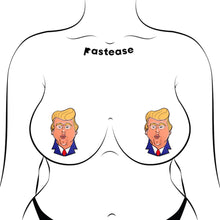 Load image into Gallery viewer, The Donald J Trump Pasties DJT Nipple Covers by Pastease shown on a femme body outline for size reference on a white background. Two nipple covers of donald j trump busts in a cartoon style with his orange tan, yellow blonde hair and blue suit with red tie, he is puckering his lips for a kiss. Perfect for a festival, burlesque performance, drag shows, pride or parties.
