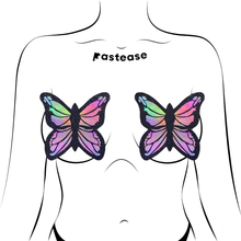 Load image into Gallery viewer, Coverage: Butterfly Rainbow Twinkle Velvet Full Breast Covers Support Tape by Pastease. Two glittery butterfly shaped nipple covers, shown on a femme body outline for size reference on a white background. Perfect for festivals, pride, burlesque, raves, only fans content or parties.