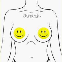 Load image into Gallery viewer, Smiley Faces: Bright Yellow Nipple Pasties by PasteaseĀ®. Two yellow smiley face nipple covers, shown on drawing of chest. Perfect for a festival, burlesque performance, pride or parties.