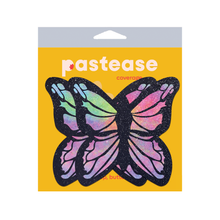Load image into Gallery viewer, Coverage: Butterfly Rainbow Twinkle Velvet Full Breast Covers Support Tape by Pastease. Two glittery butterfly shaped nipple covers in the pastease cellophane packaging, shown on a white background. Perfect for a festival, pride, burlesque performance, only fans content, or a party.