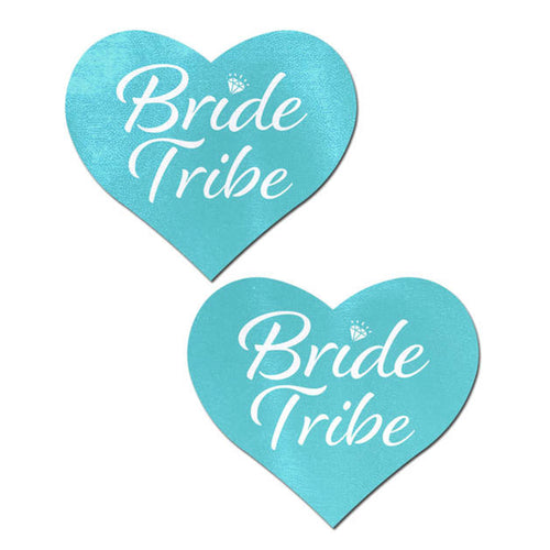 Love: Blue 'Bride Tribe' Heart Nipple Pasties by Pastease. Two pastel aqua blue heart shaped nipple covers with bride tribe white script text with a tiny diamond over the i shown on a white background. Perfect for a festival, pride, burlesque performance, only fans content or a hen do party.