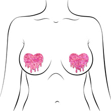 Load image into Gallery viewer, Melty Heart: Melty Heart Nipple Pasties by Pastease. Two holographic black drippy style shaped hearts shown on a femme body outline for size reference on a white background.