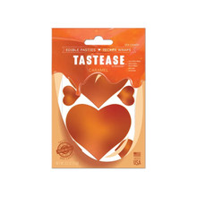 Load image into Gallery viewer, Tastease: Caramel Edible Pasties & Pecker Wrap by Pastease® o/s. Pack of edible caramel flavoured nipple covers on a white background. Perfect for a festival, pride, burlesque performance, only fans content or a party.