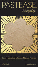 Load image into Gallery viewer, Everyday reusable: camel suede flower with mini hearts reusable nipple pasties by pastease. One camel coloured flower on the pastease everyday black and gold packaging backing. Perfect for a festival, pride, burlesque performance, only fans content or a party.