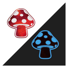 Load image into Gallery viewer, The Mushroom: Shiny Red & White glow-in-the-dark Shroom Nipple Pasties by Pastease. Two red and white glow in the dark mushroom nipple covers on a white background. Perfect for a festival, pride, burlesque performance, only fans content or a party.
