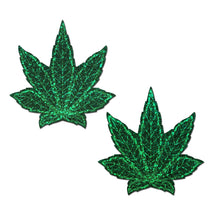 Load image into Gallery viewer, Indica Pot Leaf: Glittery green Weed Pasties by Pastease® o/s. Two green sparkly weed shaped nipple covers on a white background. Perfect for a festival, pride, burlesque performance, only fans content or a party.