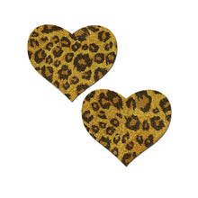 Load image into Gallery viewer, Love: Glittering Gold Leopard Print Heart Nipple Pasties by Pastease. Two heart shaped nipple covers in sparkly gold with brown leopard print all over shown on a white background. Perfect for a festival, pride, burlesque performance, only fans content or a party.