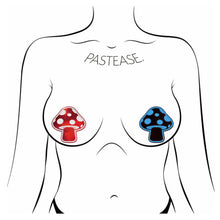Load image into Gallery viewer, The Mushroom: Shiny Red & White glow-in-the-dark Shroom Nipple Pasties by Pastease. Two red and white glow in the dark mushroom nipple covers shown on a femme body outline for size reference on a white background.
