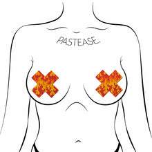 Load image into Gallery viewer, Plus X: Flaming Sparkle Cross Nipple Pasties by Pastease o/s. Two glittery flame cross nipple covers shown on a femme body outline for sizing reference on a white background.