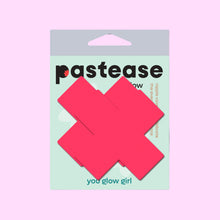 Load image into Gallery viewer, Plus X Glow-in-the-Dark Neon Pink Cross Pasties Nipple Covers by Pastease® in original packaging. The packaging is mint green with bold black branding and a “You Glow Girl” tagline. The vibrant pink pasties are front and centre, shaped like thick cross symbols.
