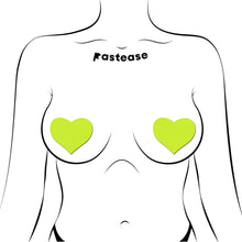 Load image into Gallery viewer, Pastease Love Glow in the Dark Neon Yellow Heart Pasties displayed on an illustrated model. These heart-shaped pasties are skin-safe, waterproof, and perfect for creating a fun and sultry look. Handmade by Pastease®, a family-run USA business.
