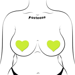 Pastease Love Glow in the Dark Neon Yellow Heart Nipple Covers worn by an illustrated figure. Showcasing a cheeky and stylish fit, these pasties are skin-safe, waterproof, and glow brilliantly in the dark. Handmade in the USA by Pastease®.