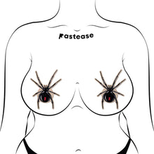 Load image into Gallery viewer, Black Widow Pasties by Pastease® on a model. These spider-shaped nipple covers feature a sparkling velvet finish and red hourglass details, perfect for Halloween. Handmade in the USA by a family-run business, they offer a unique, flirty design for all shapes and sizes.
