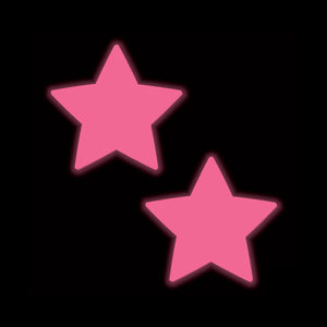 Neon Pink Glow in the Dark Star Nipple Covers by Pastease® glowing on a black background. These bold, flirty pasties are perfect for adding a statement to your style, handcrafted in the USA by a family-operated brand.