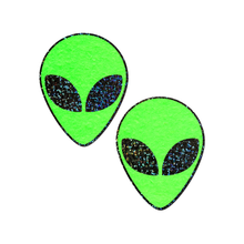 Load image into Gallery viewer, Alien: Neon Green/Glow in the Dark with Glittering Black Eyes Nipple Pasties by Pastease®. Two bright green extraterrestrial alien heads with glitter black eyes nipple covers shown on a white background. Perfect for festivals, pride, burlesque, raves, only fans content or parties.
