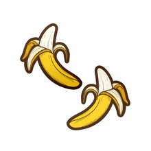 Load image into Gallery viewer, The Banana Pasties Long Yellow Nipple Covers by Pastease®. Two bananas being peeled open nipple covers on a white background. Perfect for a festival, burlesque performance, drag shows, pride or parties.
