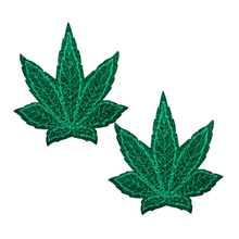 Load image into Gallery viewer, Coverage: Pot Leaf Glitter Green Full Breast Covers Support Tape by Pastease®. Two green glittery weed leaf shaped nipple covers on a white background. Perfect for a festival, pride, burlesque performance, only fans content, 420 or a party.
