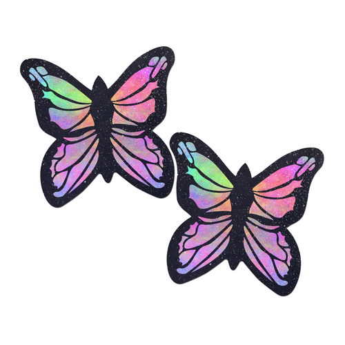 Coverage: Butterfly Rainbow Twinkle Velvet Full Breast Covers Support Tape by Pastease. Two glittery butterfly shaped nipple covers, shown on a white background. Perfect for festivals, pride, burlesque, raves, only fans content or parties.