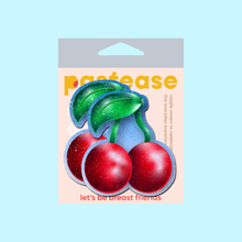 Load image into Gallery viewer, The Cherry: Red Cherries on Glitter Velvet Nipple Pasties by Pastease inside the pastease pastel packaging on a pale blue background. Two bright red cherries made from glittery velvet with green stems and leaf.
