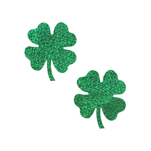 The Four Leaf Clover: Glittering Green Shamrocks Nipple Pasties by Pastease® on a white background. Two green glitter four leaf clover nipple covers. Perfect for a festival, burlesque performance, drag shows, pride or parties.