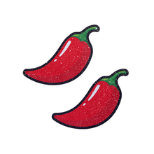Load image into Gallery viewer, Chilli Pepper Pasties in Spicy Red by Pastease. Two sparkly glitter red chilli pepper shaped nipple covers shown on a white background. Perfect for festivals, pride, burlesque, raves, only fans content or parties.
