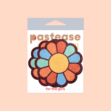 Load image into Gallery viewer,  The Rainbow Flower Pasties Hippy Rainbow Daisy Breast Covers by Pastease®. Two rainbow coloured flower shaped nipple covers in pastease pastel packaging on a light orange background. Perfect for a festival, burlesque performance, pride or parties.
