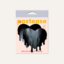 Load image into Gallery viewer, Melty Heart: Faux Latex Pleather Vinyl Black Melty Heart Nipple Pasties by Pastease®. Two shiny black drippy heart shaped nipple covers shown in the pastease packaging on a cream background.
