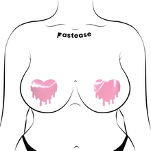 Load image into Gallery viewer, Melty Heart: Faux Latex Pleather Vinyl Baby Pink Melty Heart Nipple Pasties by Pastease®. Two shiny pastel pink drippy heart shaped nipple covers shown on a femme body outline for size reference on a white background.
