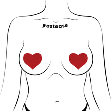 Load image into Gallery viewer, Love: Red Heart Nipple Pasties by Pastease®. Two matte red heart shaped nipple covers shown on a femme body outline for size reference on a white background.
