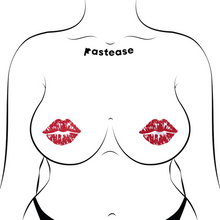 Load image into Gallery viewer, Kisses: Sparkly Red Kissing Puckered Lips Nipple Covers by Pastease. Two glitter red kissing lip shaped nipple covers shown on a femme body outline for size reference on a white background.
