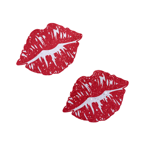 Kisses: Sparkly Red Kissing Puckered Lips Nipple Covers by Pastease. Two glitter red kissing lip shaped nipple covers shown on a white background. Perfect for festivals, pride, burlesque, raves, only fans content or parties.