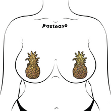 Load image into Gallery viewer, The Pineapple on Glitter Gold Nipple Covers by Pastease®. Two gold glittering shimmer pineapple nipple covers shown on a femme body outline on a white background. Perfect for a festival, burlesque performance, drag shows, pride or parties.
