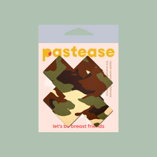 Load image into Gallery viewer, Plus X: Green Camo Cross Nipple Pasties by Pastease®. Two green, brown, and cream camouflage cross shaped nipple covers shown in the pastease packaging on a khaki background.
